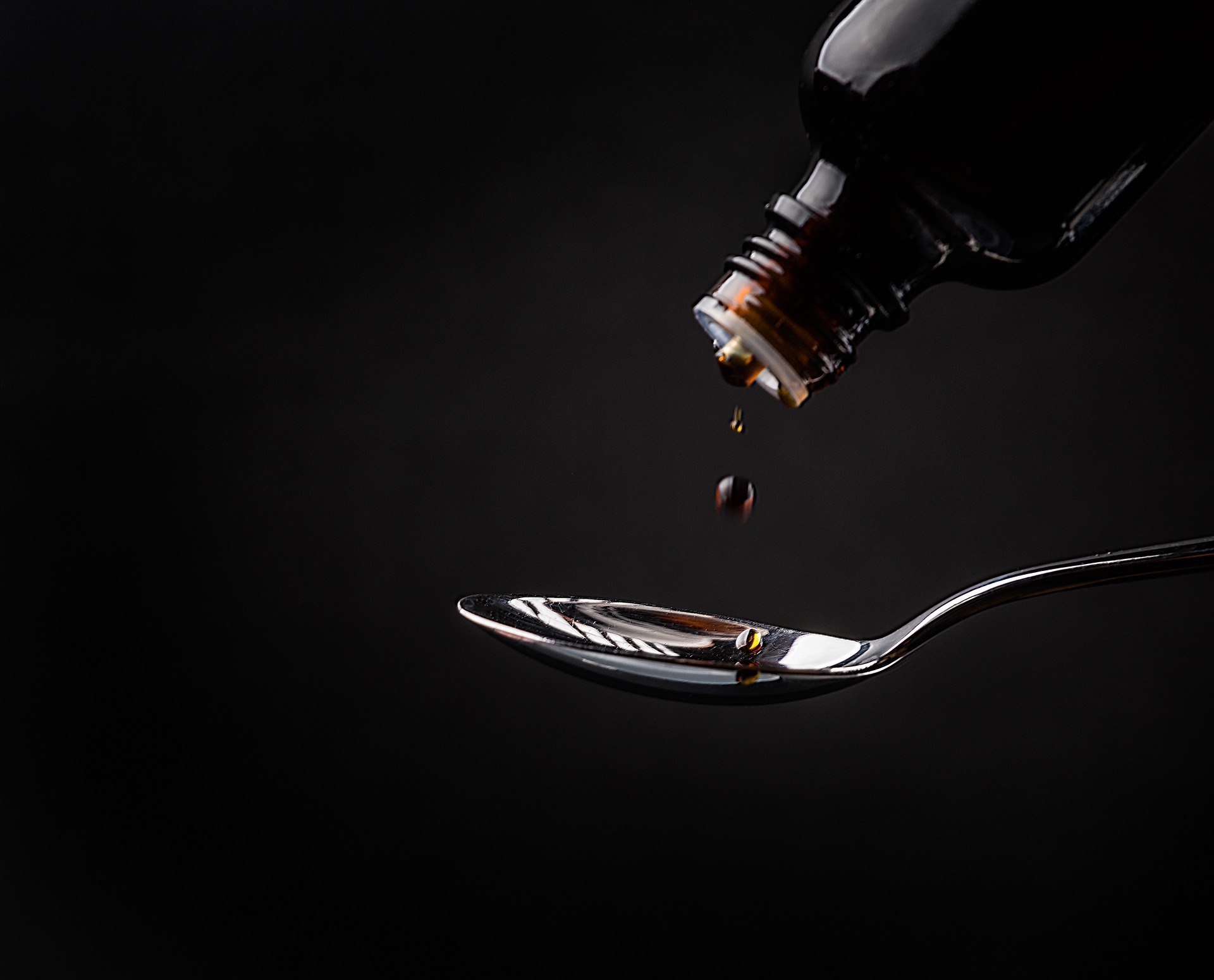 Insights Blog 4 Liquid medicine dripping into spoon