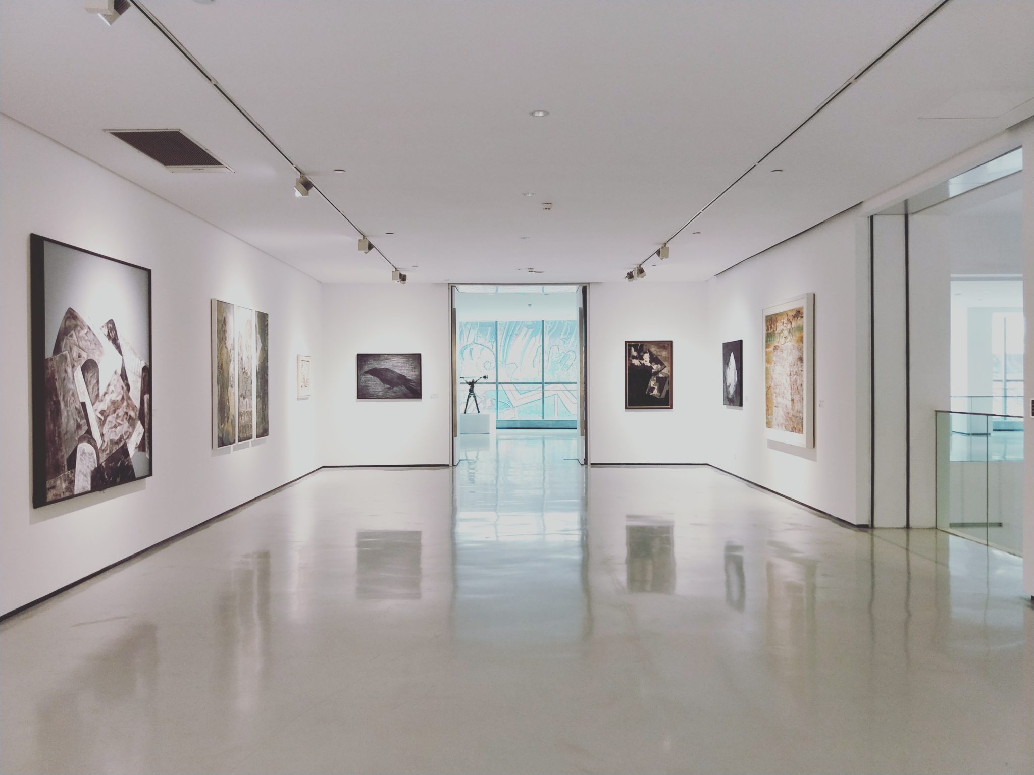 Insights Blog 9 Art gallery with framed photographs displayed.