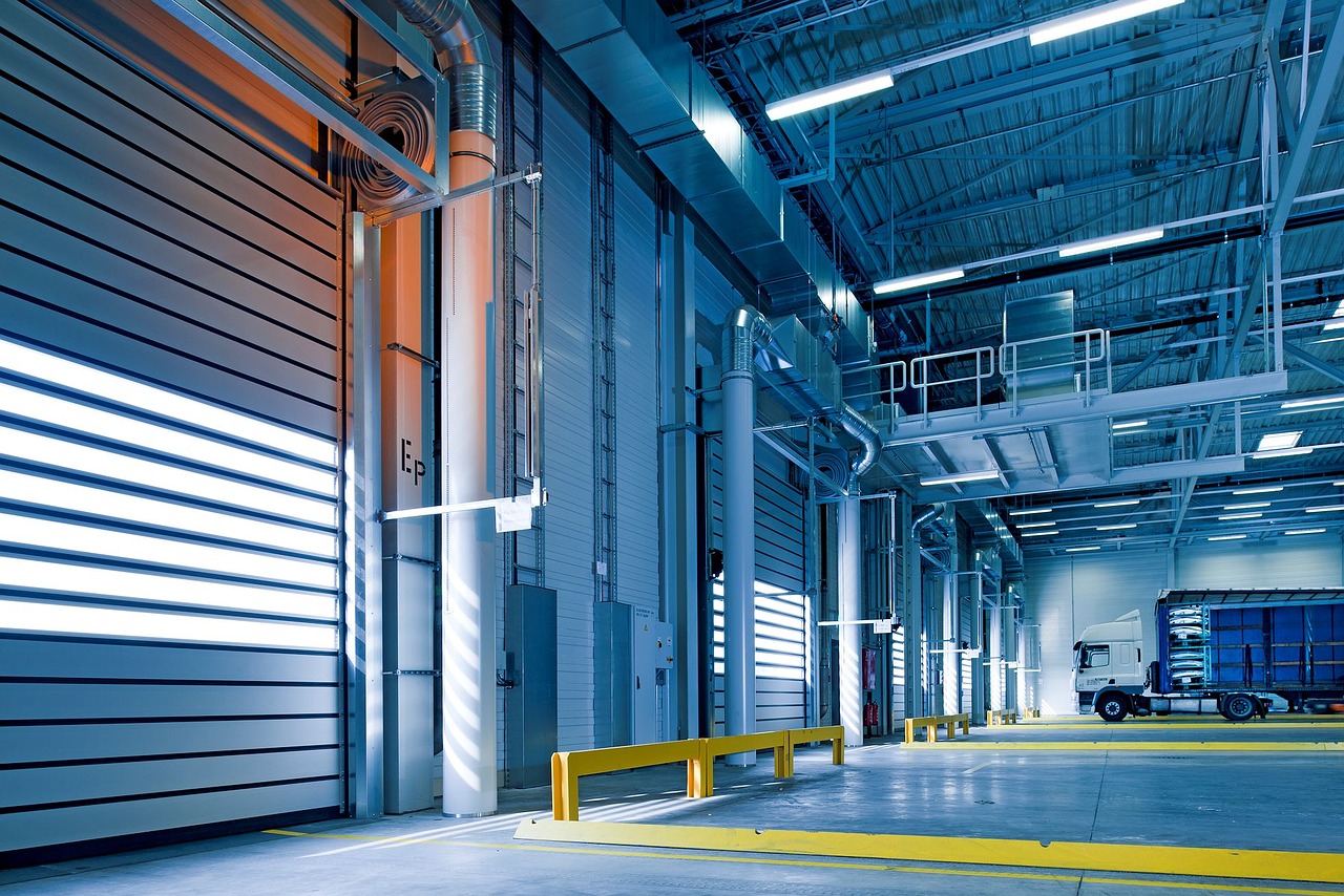 Insights Blog 8 Spacious industrial warehouse with lighting