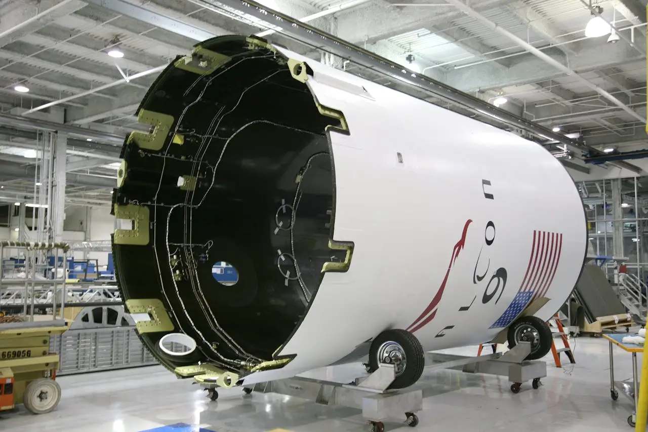 Insights Blog 6 Rocket fairing inside aerospace manufacturing facility.