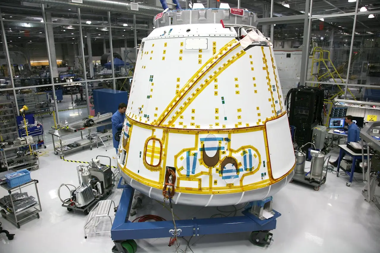Insights Blog 1 Aerospace manufacturing facility assembling spacecraft capsule in controlled cleanroom environment
