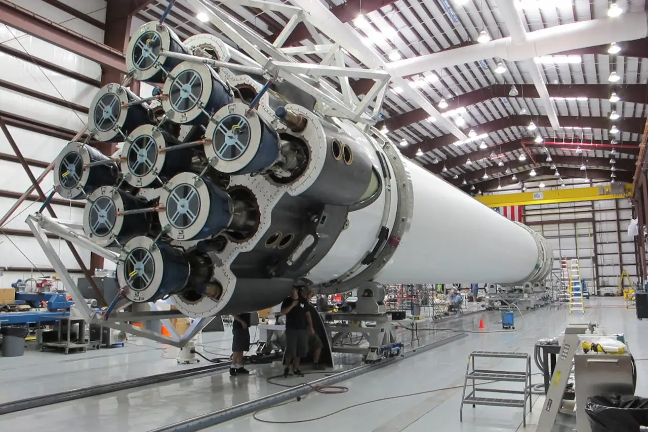 Insights Blog 5 Rocket booster inside aerospace manufacturing facility under controlled environment conditions.