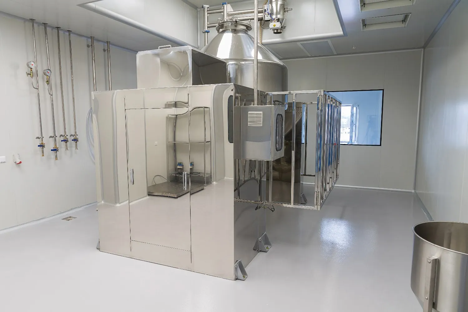 Insights Blog 4 Pharmaceutical cleanroom with industrial processing equipment and controlled systems, illustrating environments where GMP-ready humidity control is implemented.