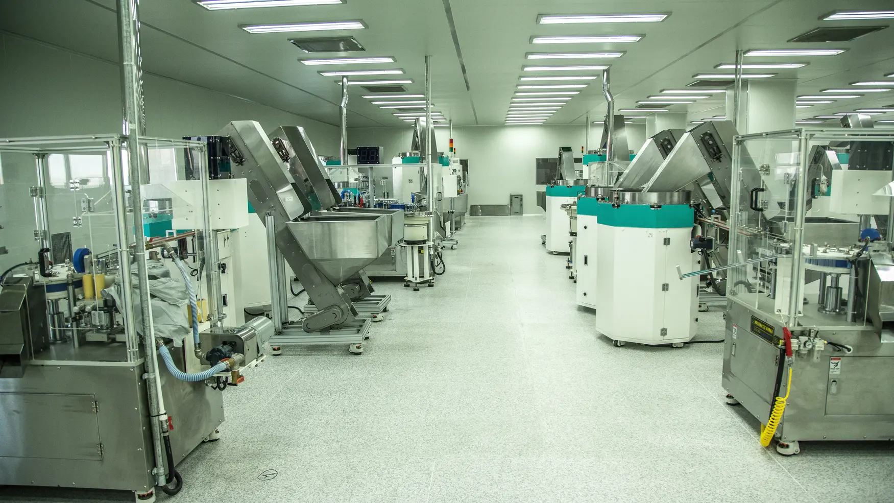 Modern food processing facility with stainless steel production equipment in a clean, climate-controlled manufacturing environment.