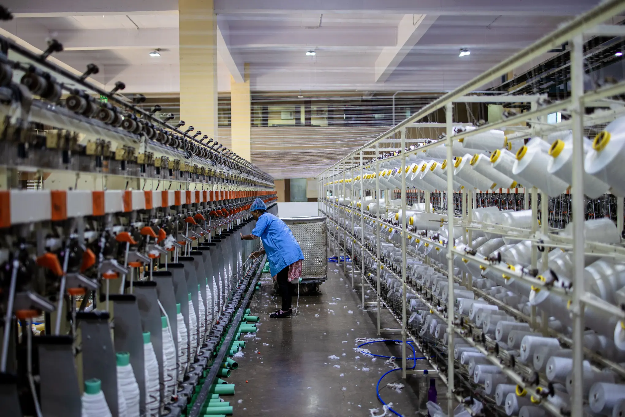 Insights Blog 4 Textile manufacturing facility with industrial spinning machines where precise humidity control helps maintain yarn quality, reduce static electricity, and improve production consistency.