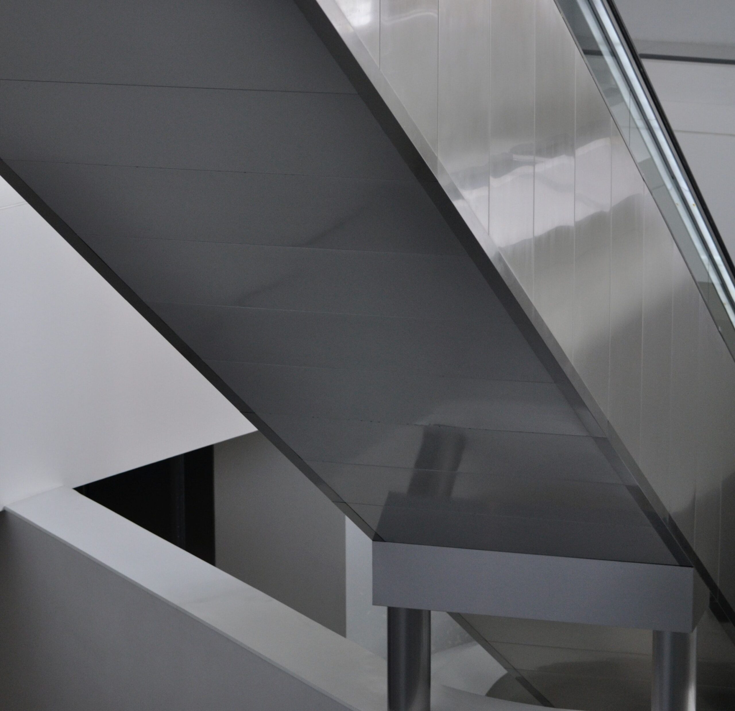 Insights Blog 2 Industrial HVAC ductwork overhead, representing the air handling systems used to distribute evaporatively cooled air in warehouse and manufacturing facilities