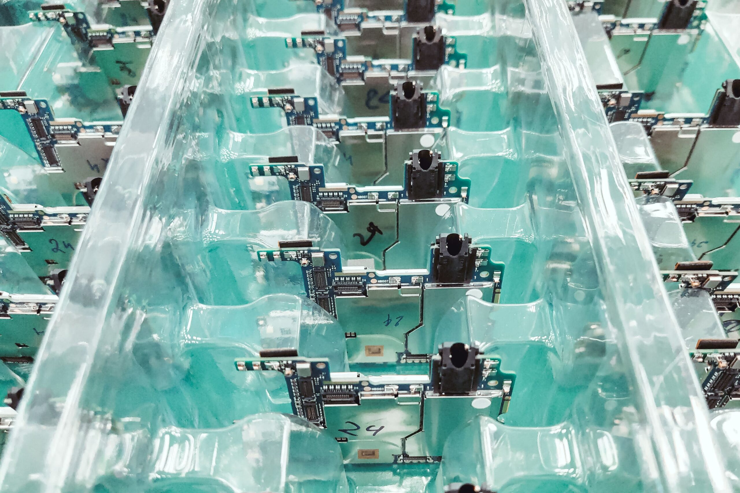Home Page 6 Electronic circuit boards in a production facility, representing the manufacturing environments where anti-static spray is inappropriate and humidity control is the proper ESD prevention method