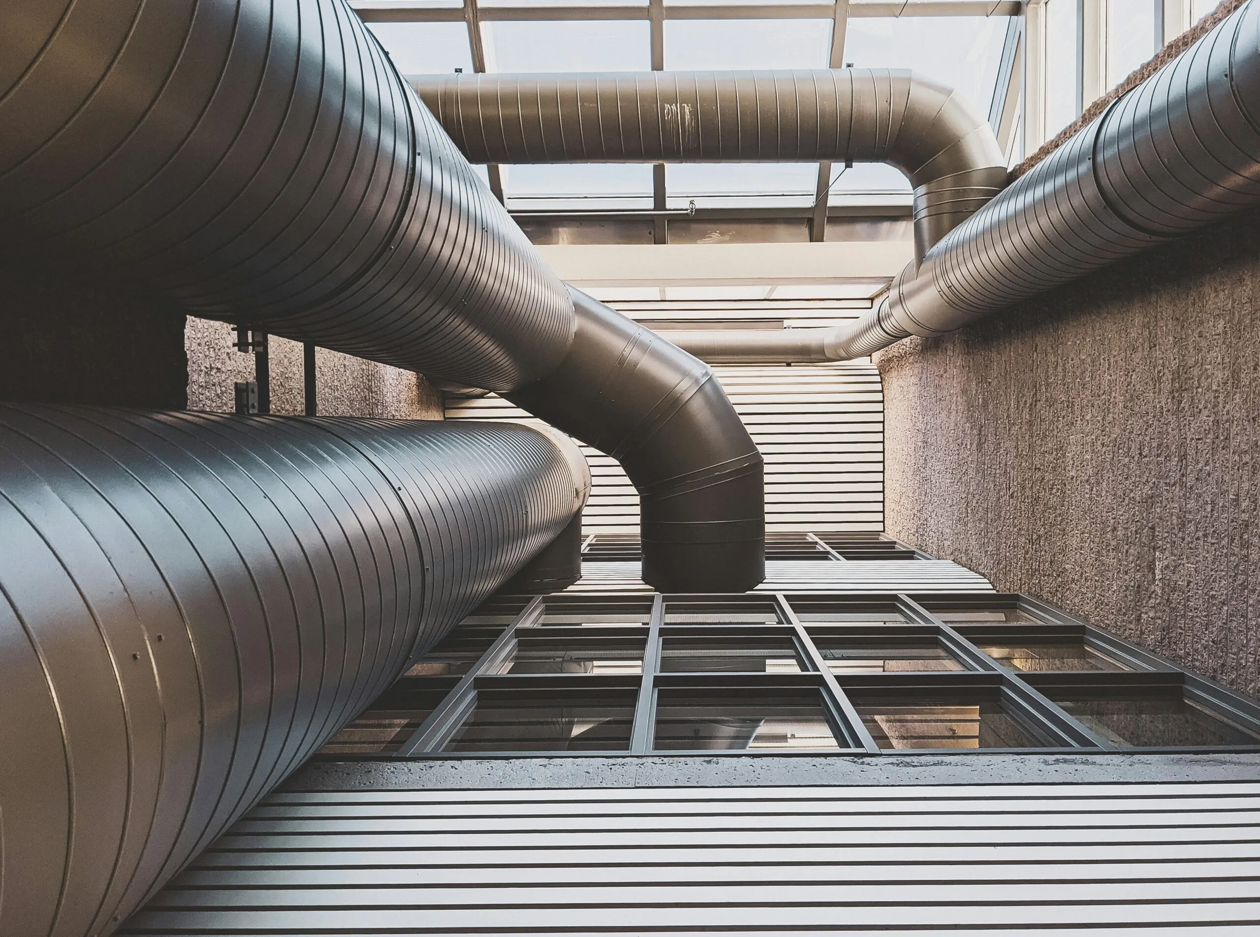 Insights Blog 8 Commercial building ductwork, part of the distribution system connected to an air handling unit.