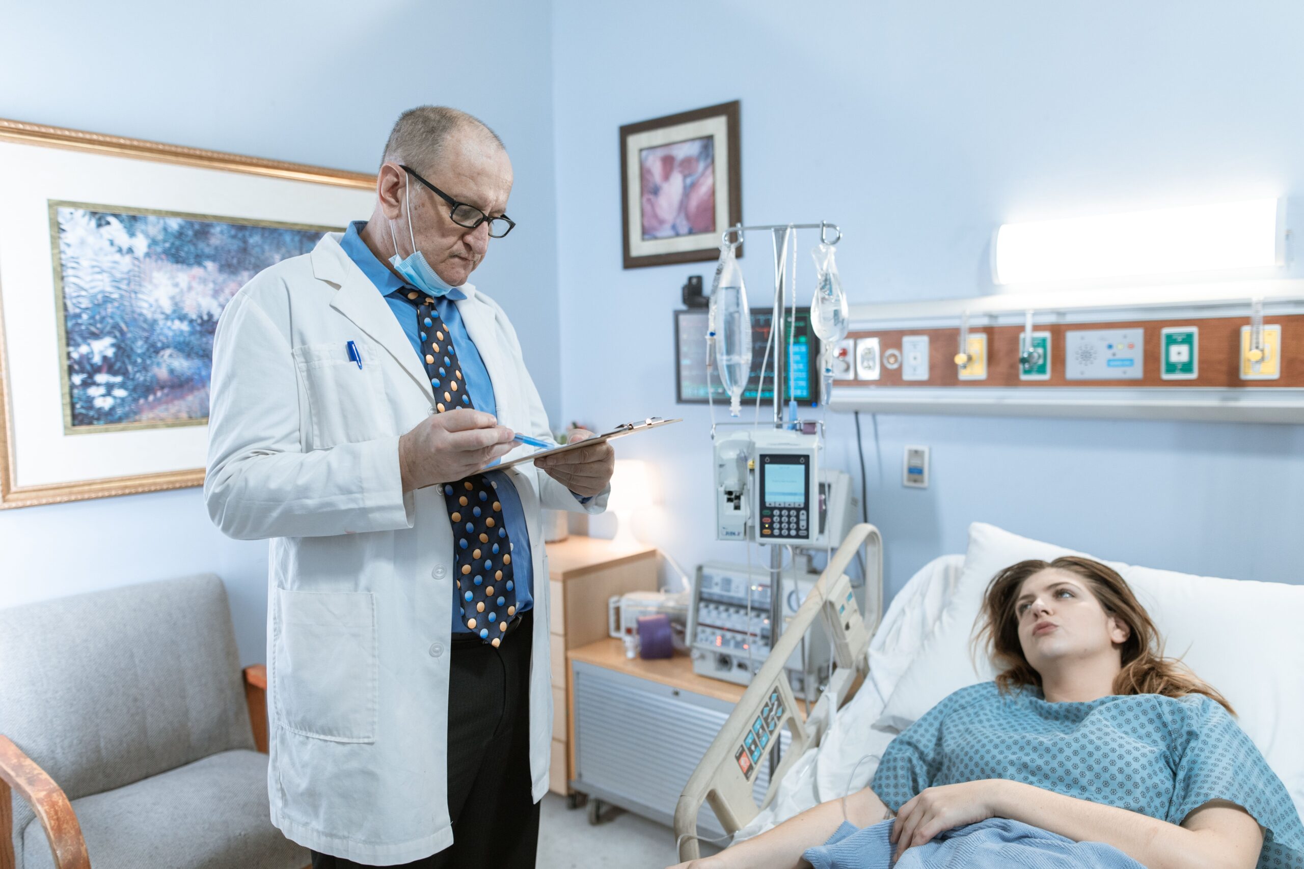 Insights Blog 9 Doctor consulting with a patient in a hospital room, where humidity control supports infection prevention.